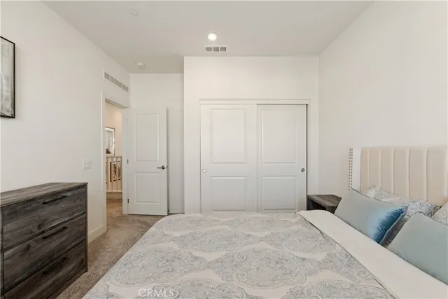 a room with gym equipment and windows