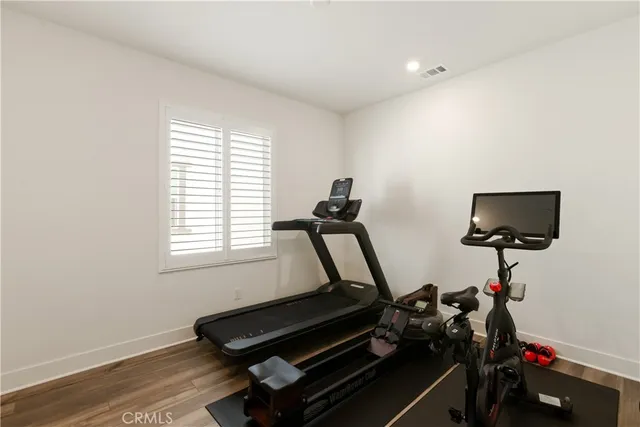 a bathroom with a sink and cabinets