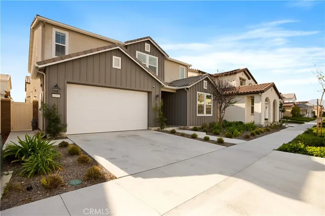 an aerial view of residential building with trees