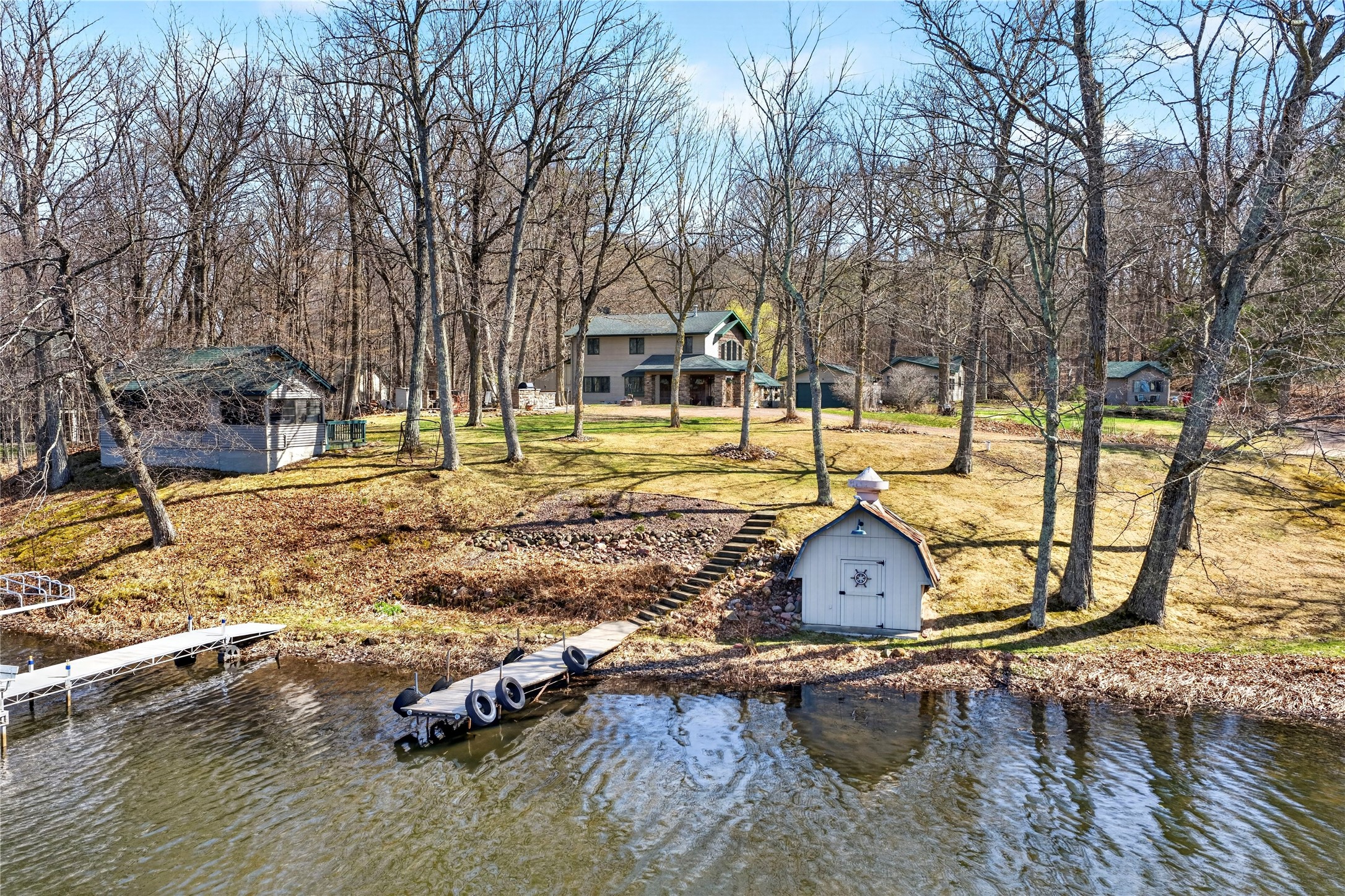 2772 25th Avenue Rice Lake, WI 54868 - Photo 1 of 60 1 Home + 3 Cabins