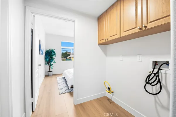 a view of entryway with wooden floor