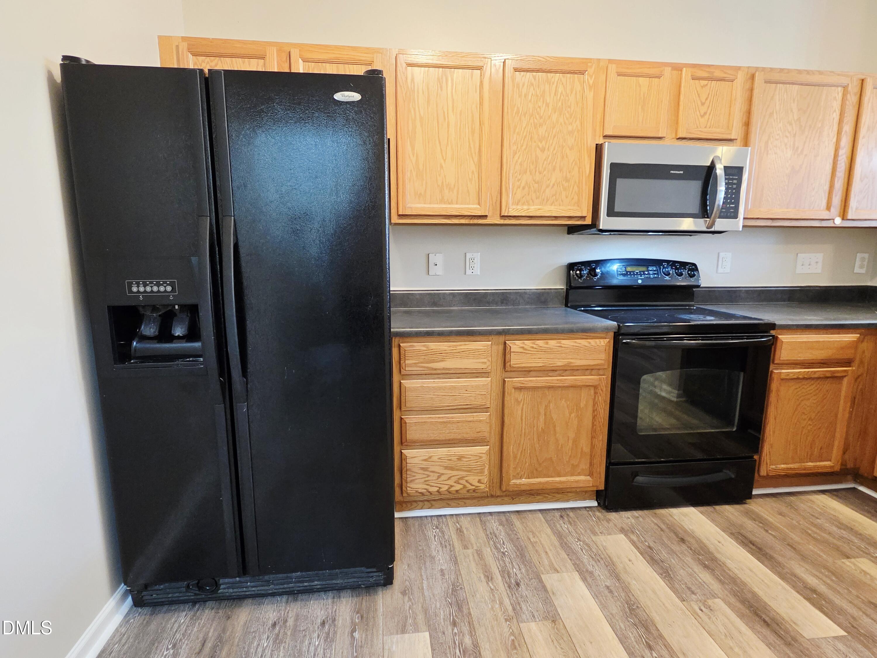 1111 Consortium Drive, Unit 103 Raleigh, NC 27603 - Photo 8 of 43 Large Fridge