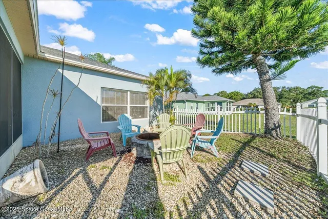 a garden view with a seating space
