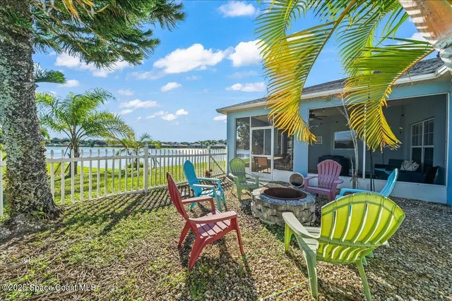 a swimming pool with wooden fence