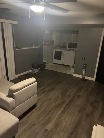 an empty room with wooden floor