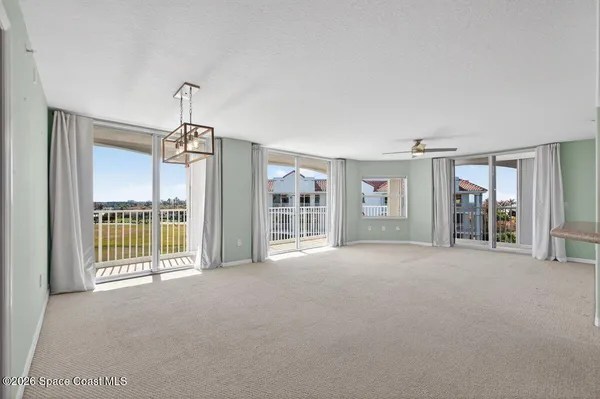 a view of a kitchen with furniture and a kitchen