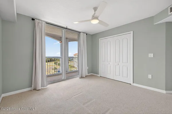 a view of swimming pool with seating area