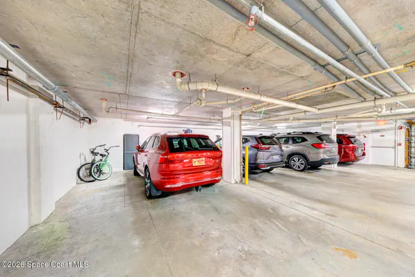a view of an house with swimming pool and porch