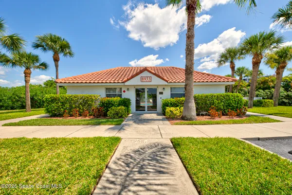 a view of a swimming pool with a lounge chair
