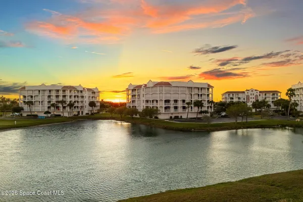 a view of livingroom with furniture flat screen tv and a large window