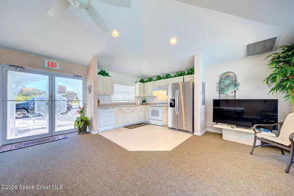 a view of swimming pool with a patio