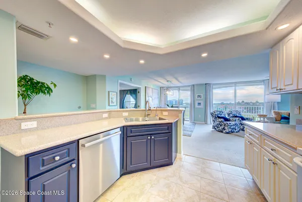 a kitchen with stainless steel appliances granite countertop a sink and cabinets