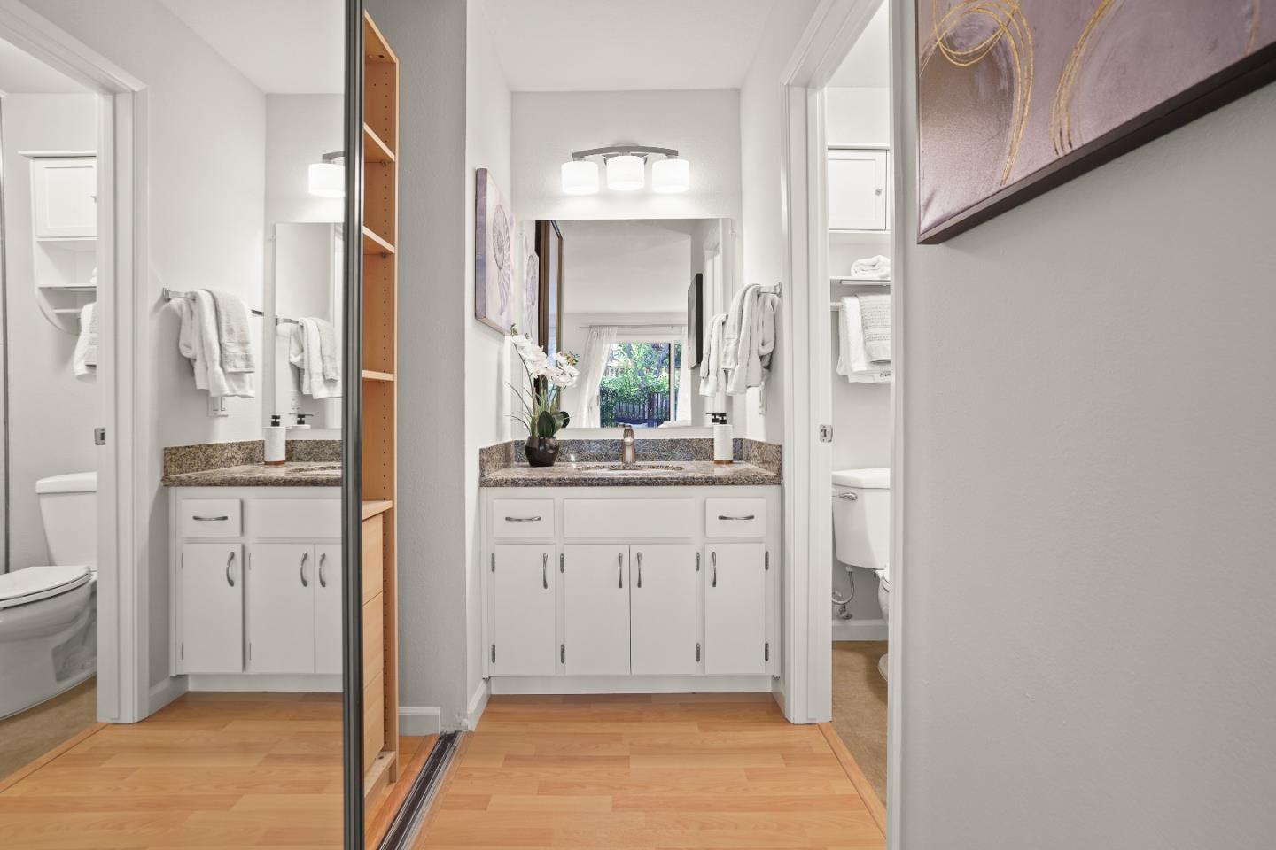 928 Wright Avenue, Unit 1005 Mountain View, CA 94043 - Photo 16 of 25 a bathroom with a sink and a mirror