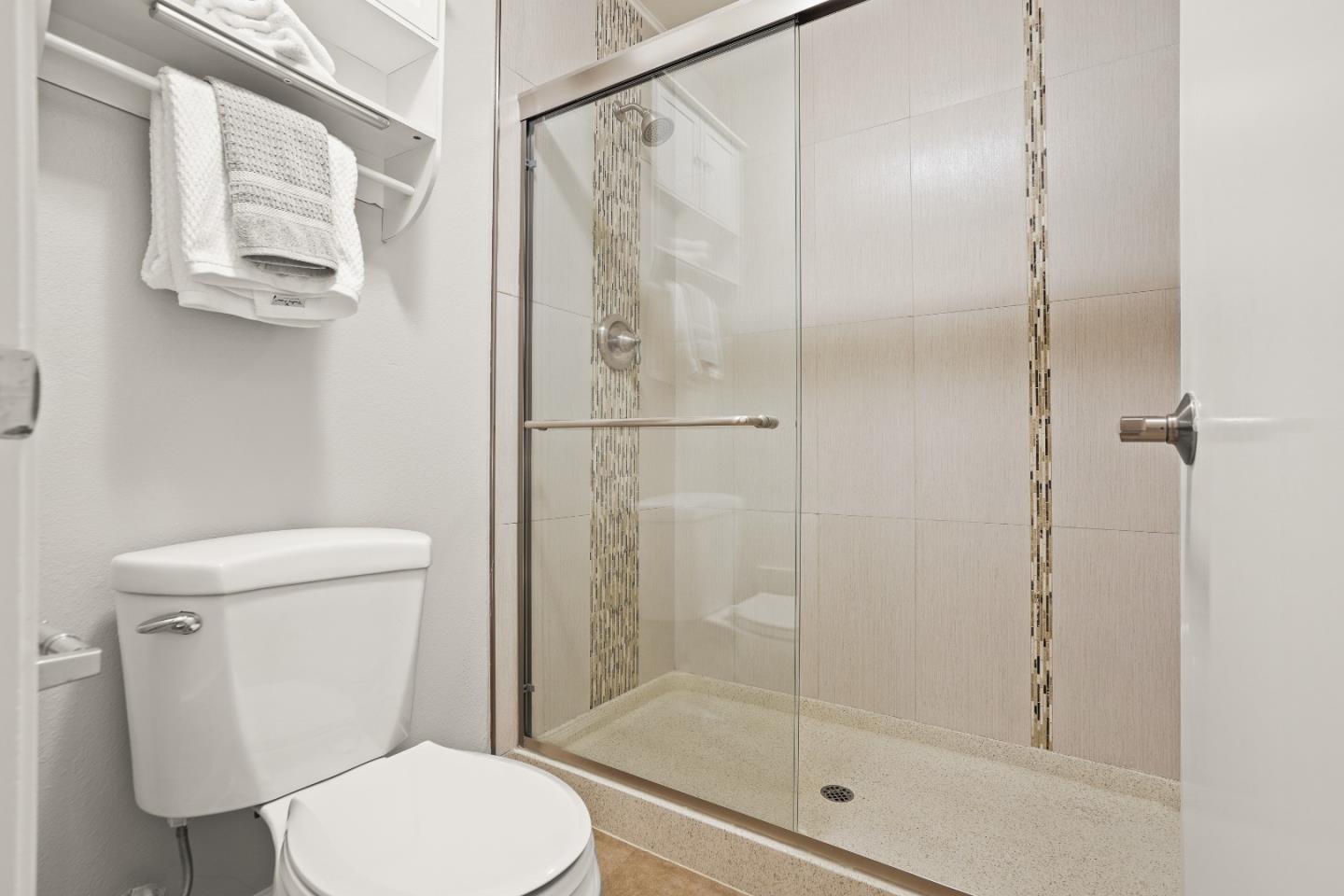 928 Wright Avenue, Unit 1005 Mountain View, CA 94043 - Photo 17 of 25 a white toilet next to a bathroom