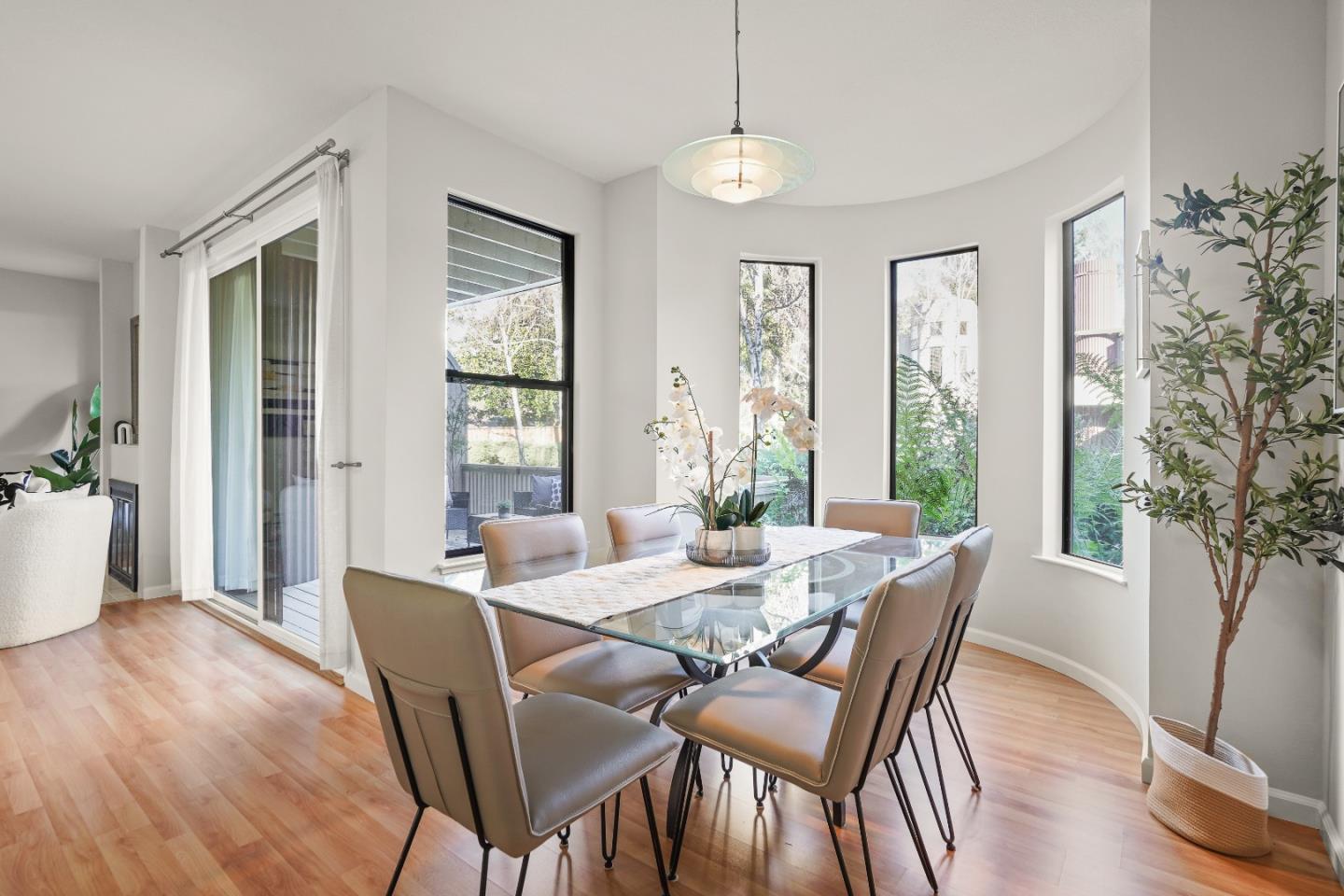 928 Wright Avenue, Unit 1005 Mountain View, CA 94043 - Photo 4 of 25 a view of a dining room with furniture window and wooden floor