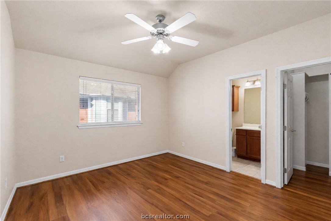 1198 Jones-Butler Road, Unit 3005 College Station, TX 77840 - Photo 12 of 24 wooden floor in an empty room with a window