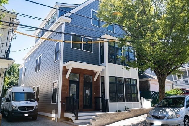 a view of a car park in front of a building