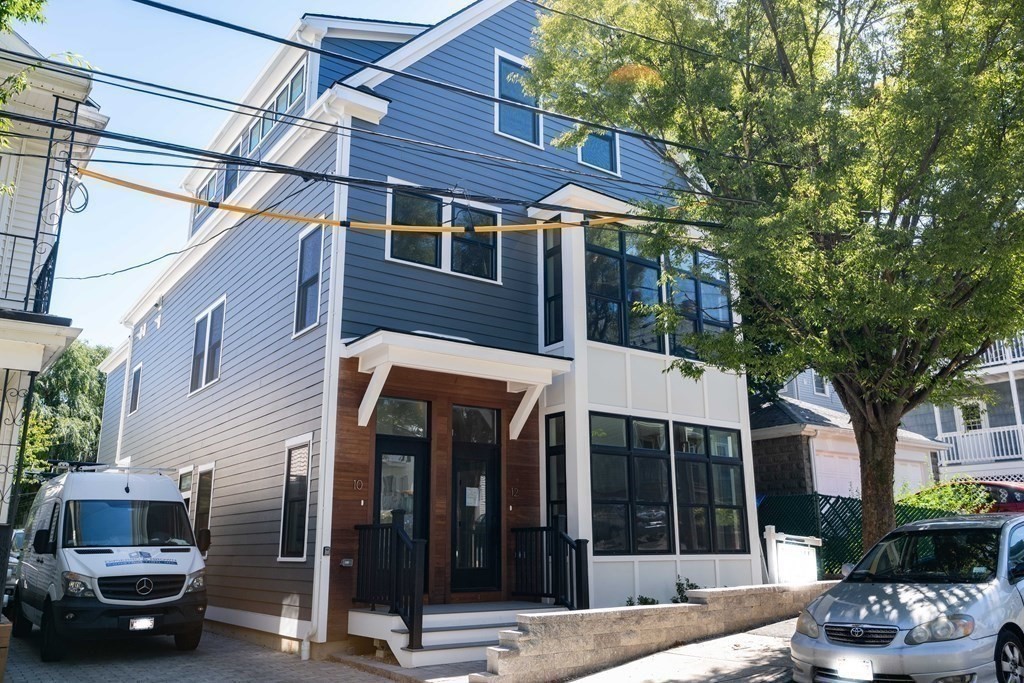10 Hardan Road, Unit 10 Somerville, MA 02144 - Photo 17 of 22 a view of a car park in front of a building