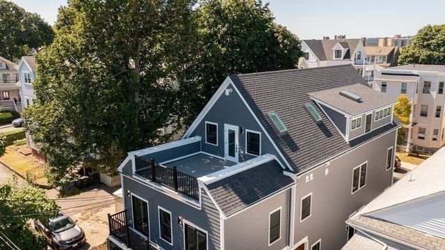 a view of a house with a trees