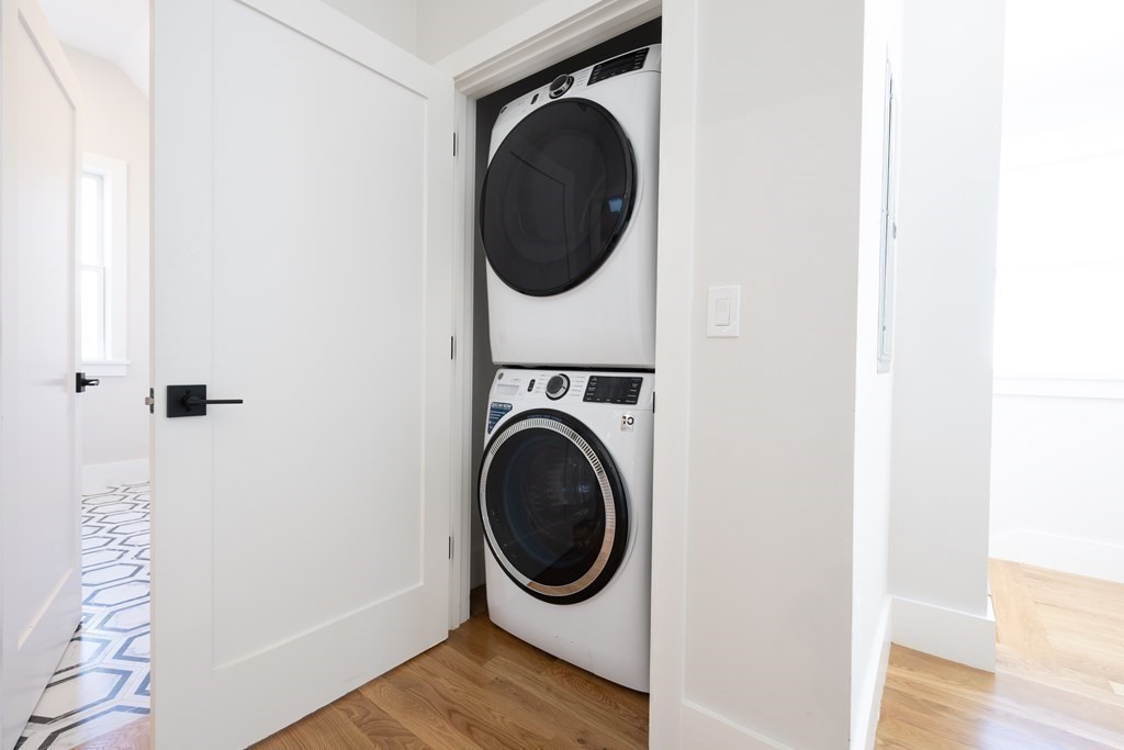 10 Hardan Road, Unit 10 Somerville, MA 02144 - Photo 10 of 22 a utility room with dryer and washer