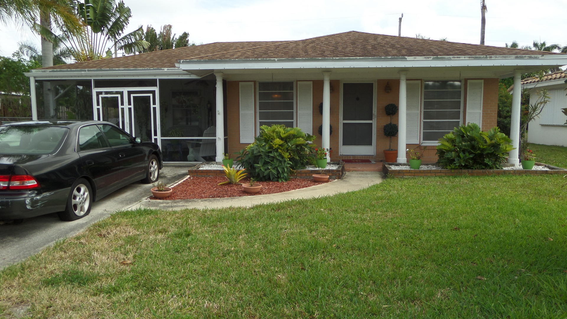 450 Northeast 34th Street Boca Raton, FL 33431 - Photo 1 of 29 FRONT OF HOUSE