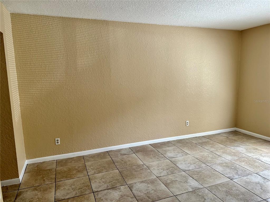 8205 Sun Spring Circle, Unit B1 Orlando, FL 32825 - Photo 8 of 14 a view of an empty room