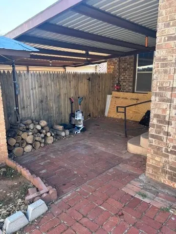 a view of a chairs in a patio