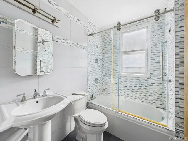 $899,000 | 36-17 201st Street | Auburndale