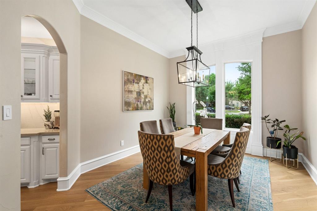 2101 Vail Road Southlake, TX 76092 - Photo 11 of 40 a dining room with furniture window wooden floor