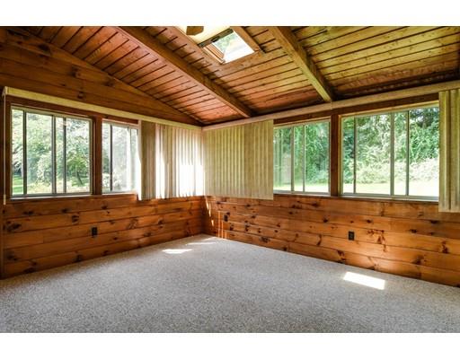 42 Larnis Road Framingham, MA 01701 - Photo 12 of 25 a large room with a large bed