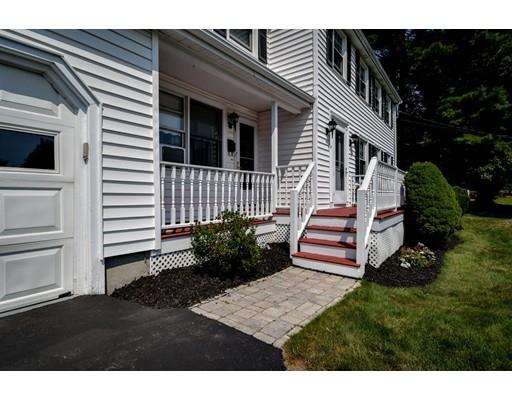42 Larnis Road Framingham, MA 01701 - Photo 2 of 25 a front view of a house with a garden