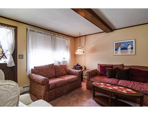 42 Larnis Road Framingham, MA 01701 - Photo 3 of 25 a living room with furniture and a couch