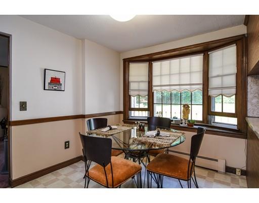 42 Larnis Road Framingham, MA 01701 - Photo 4 of 25 a dining room with furniture and large windows