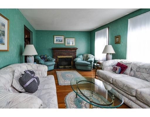 42 Larnis Road Framingham, MA 01701 - Photo 5 of 25 a living room with furniture and a fireplace