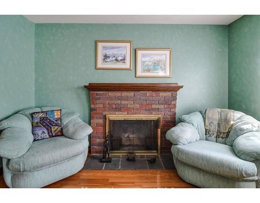 42 Larnis Road Framingham, MA 01701 - Photo 6 of 25 a living room with furniture and a fireplace
