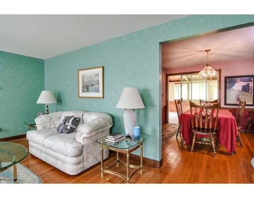 42 Larnis Road Framingham, MA 01701 - Photo 7 of 25 a living room with furniture and a wooden floor