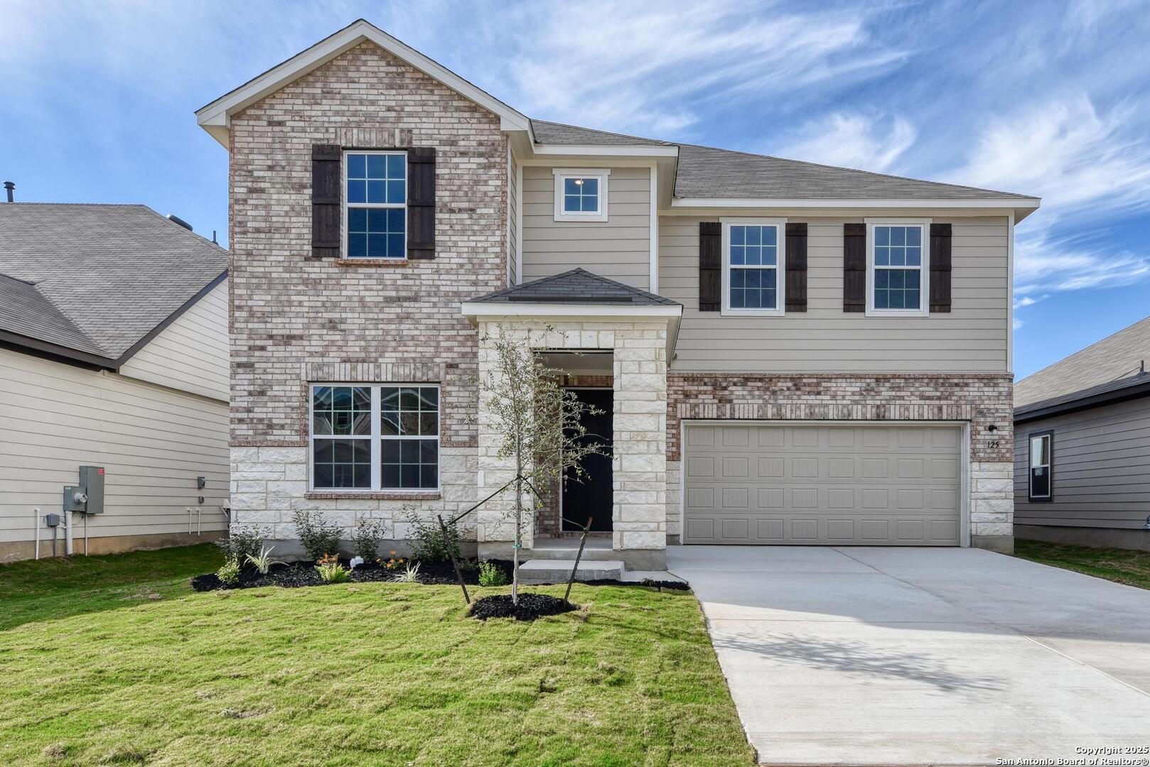 125 Beveridge Seguin, TX 78155 - Photo 1 of 1 a front view of a house with a yard