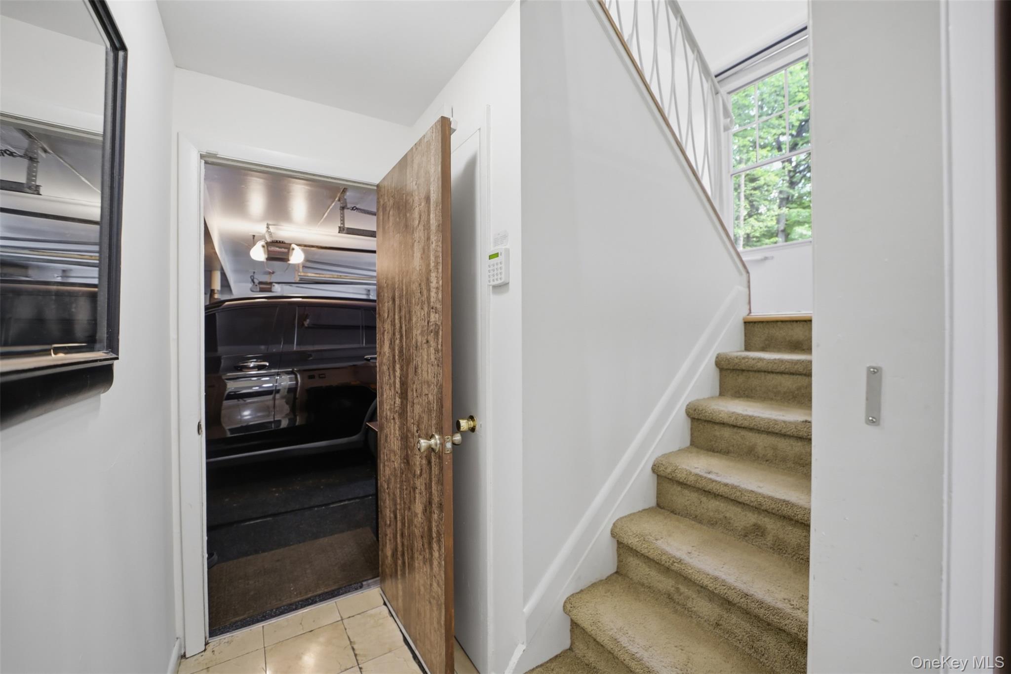 370 Furnace Dock Road Cortlandt Manor, NY 10567 - Photo 43 of 49 stairs goes to the lower level with garage entrance