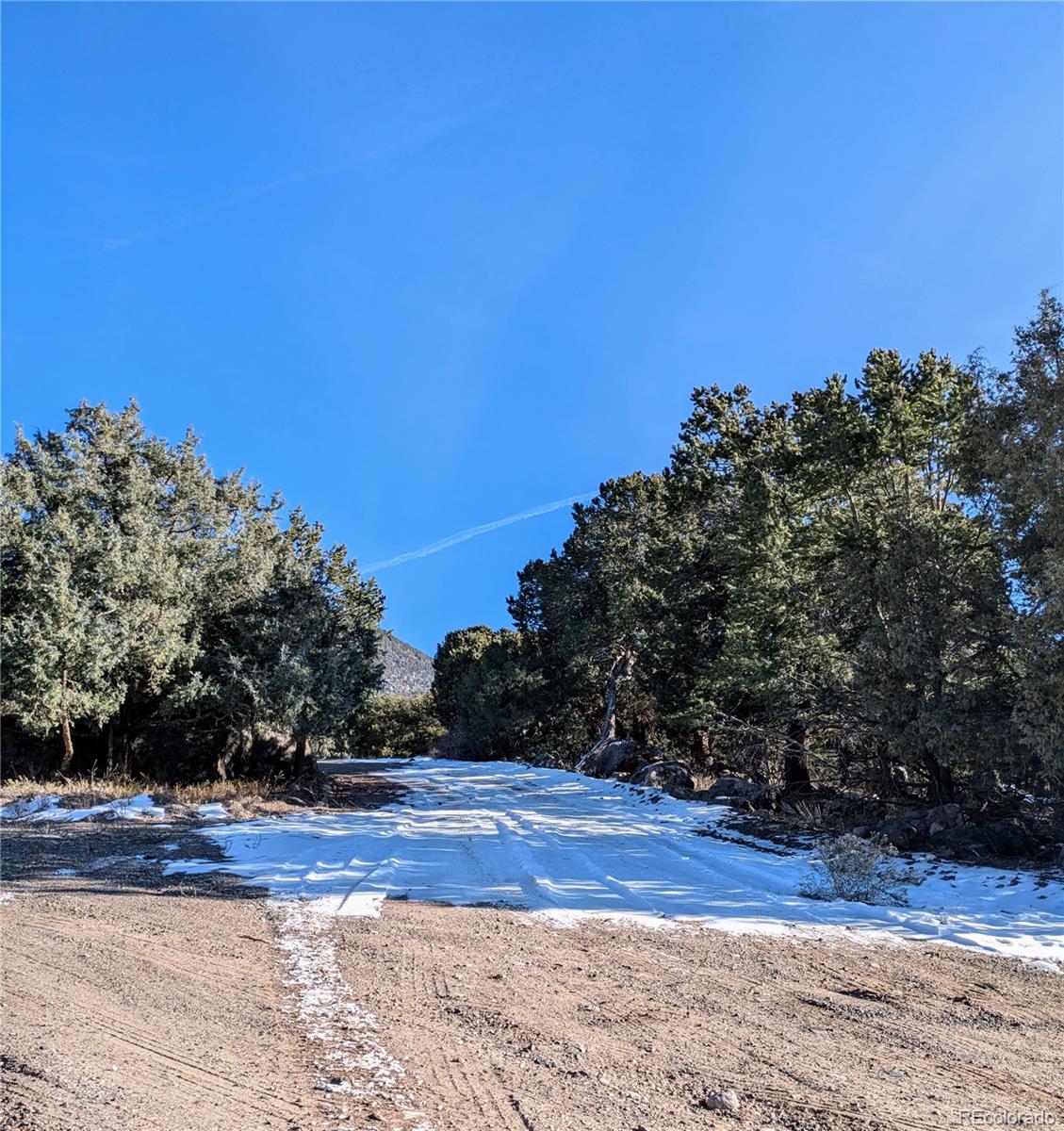 1284 Echo Point Crestone, CO 81131 - Photo 2 of 11 a view of a yard with wooden fence