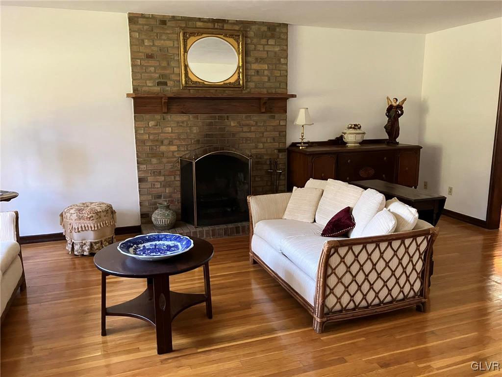 4290 Wellesley Road Bethlehem, PA 18017 - Photo 4 of 50 Floor to ceiling brick fireplace with brick hearth