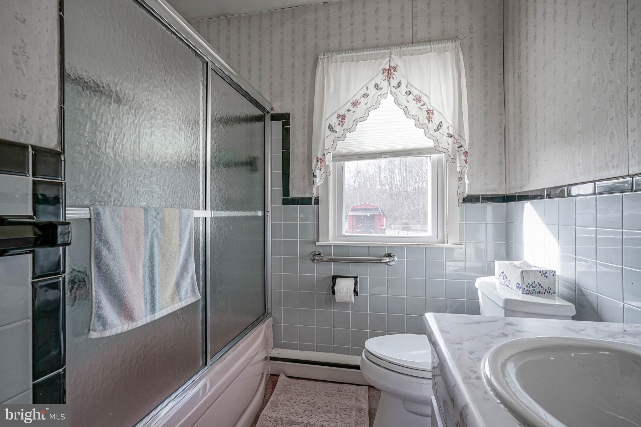 249 Cleveland Avenue Carneys Point, NJ 08069 - Photo 22 of 52 a bathroom with a sink toilet and shower