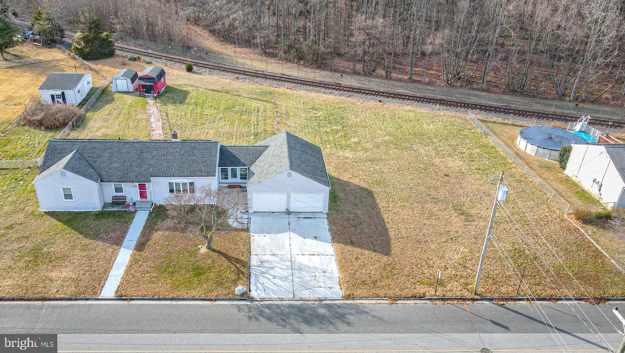 249 Cleveland Avenue Carneys Point, NJ 08069 - Photo 31 of 52 a aerial view of a house with swimming pool