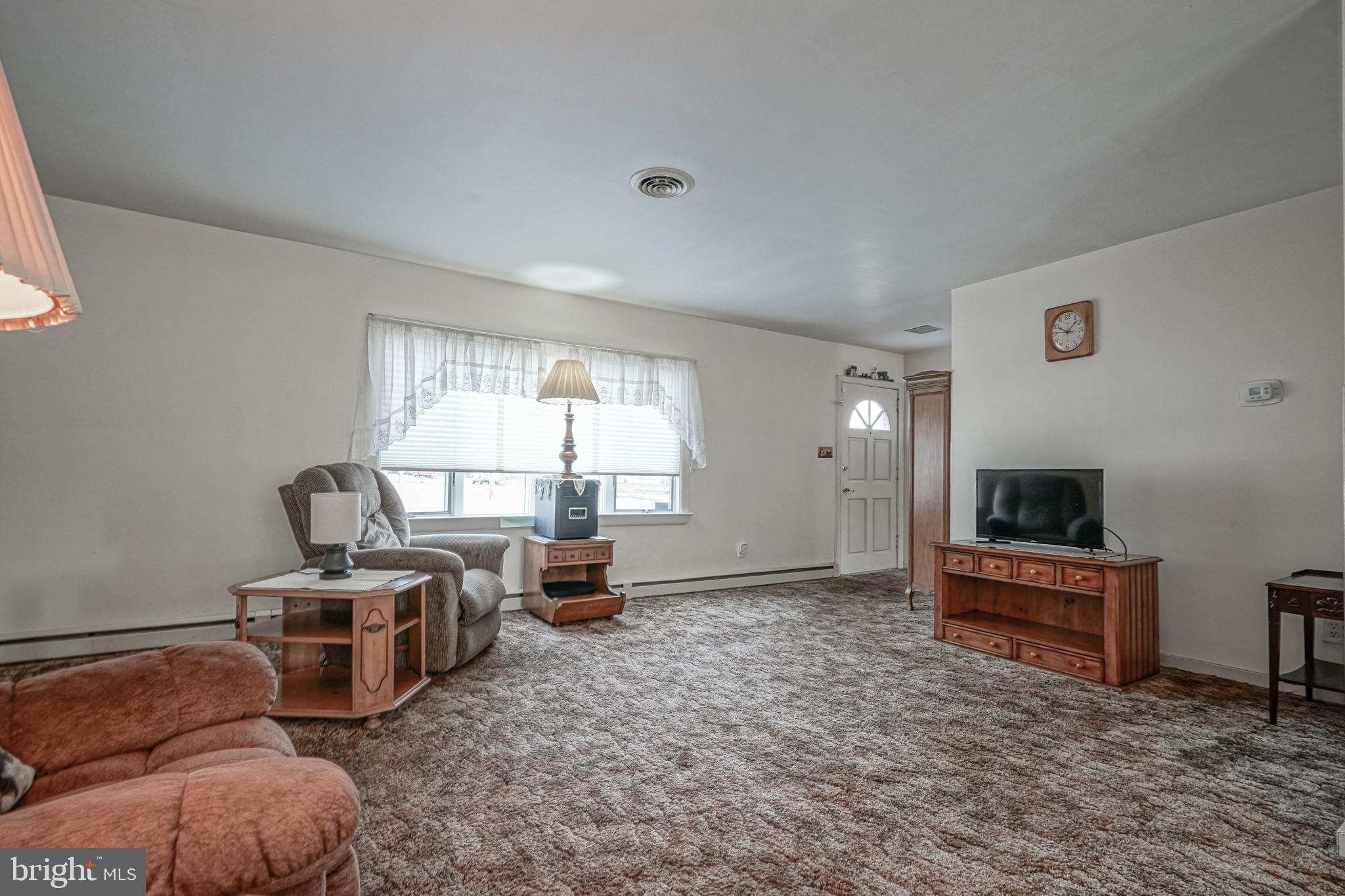 249 Cleveland Avenue Carneys Point, NJ 08069 - Photo 4 of 52 a room with furniture and a window