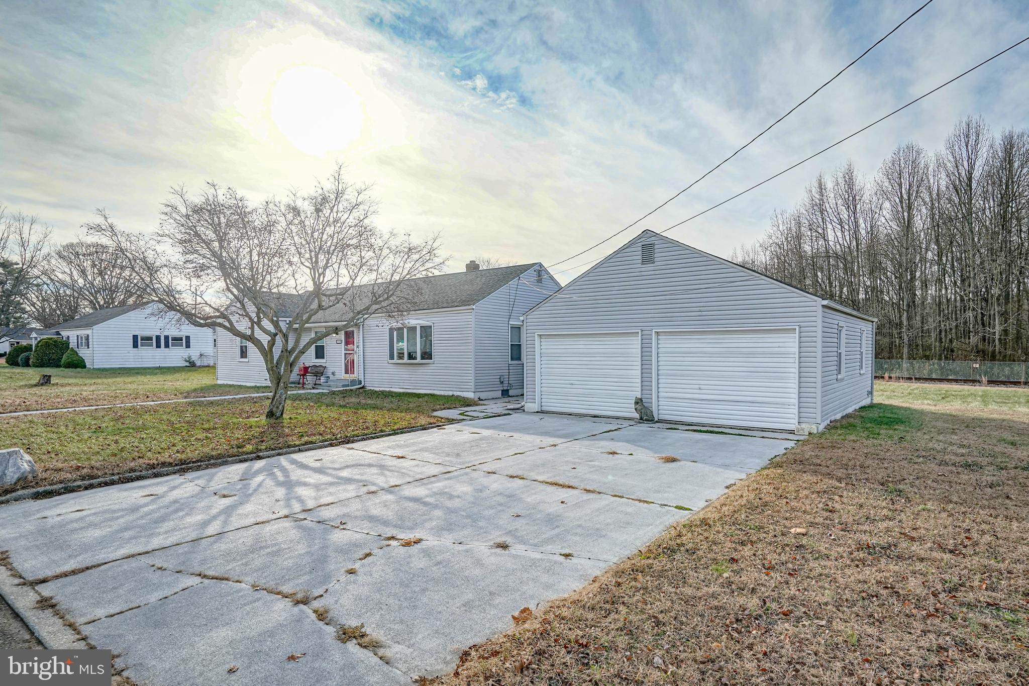 249 Cleveland Avenue Carneys Point, NJ 08069 - Photo 42 of 52 a view of a house with a yard