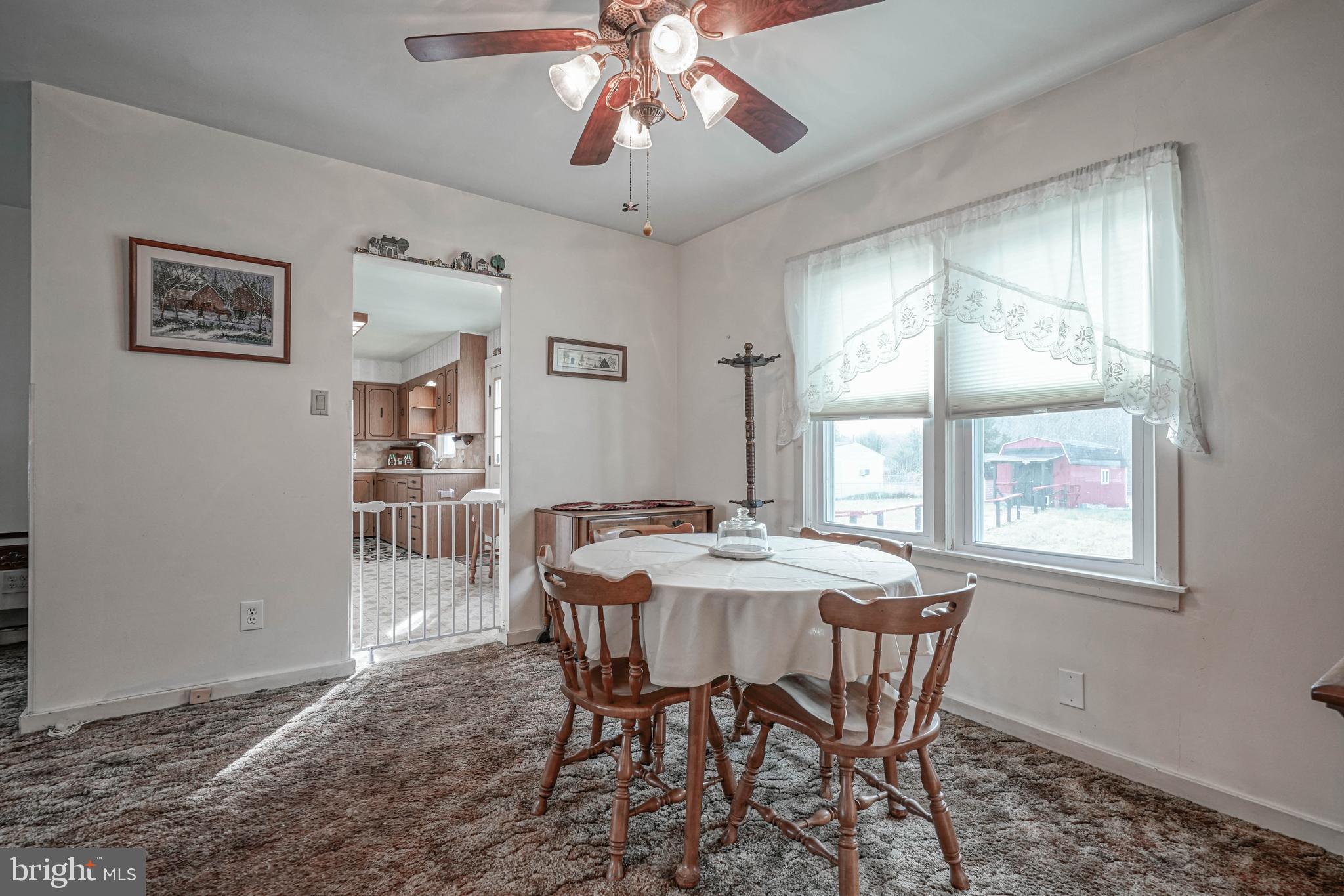249 Cleveland Avenue Carneys Point, NJ 08069 - Photo 9 of 52 a view of a dining room with furniture and window