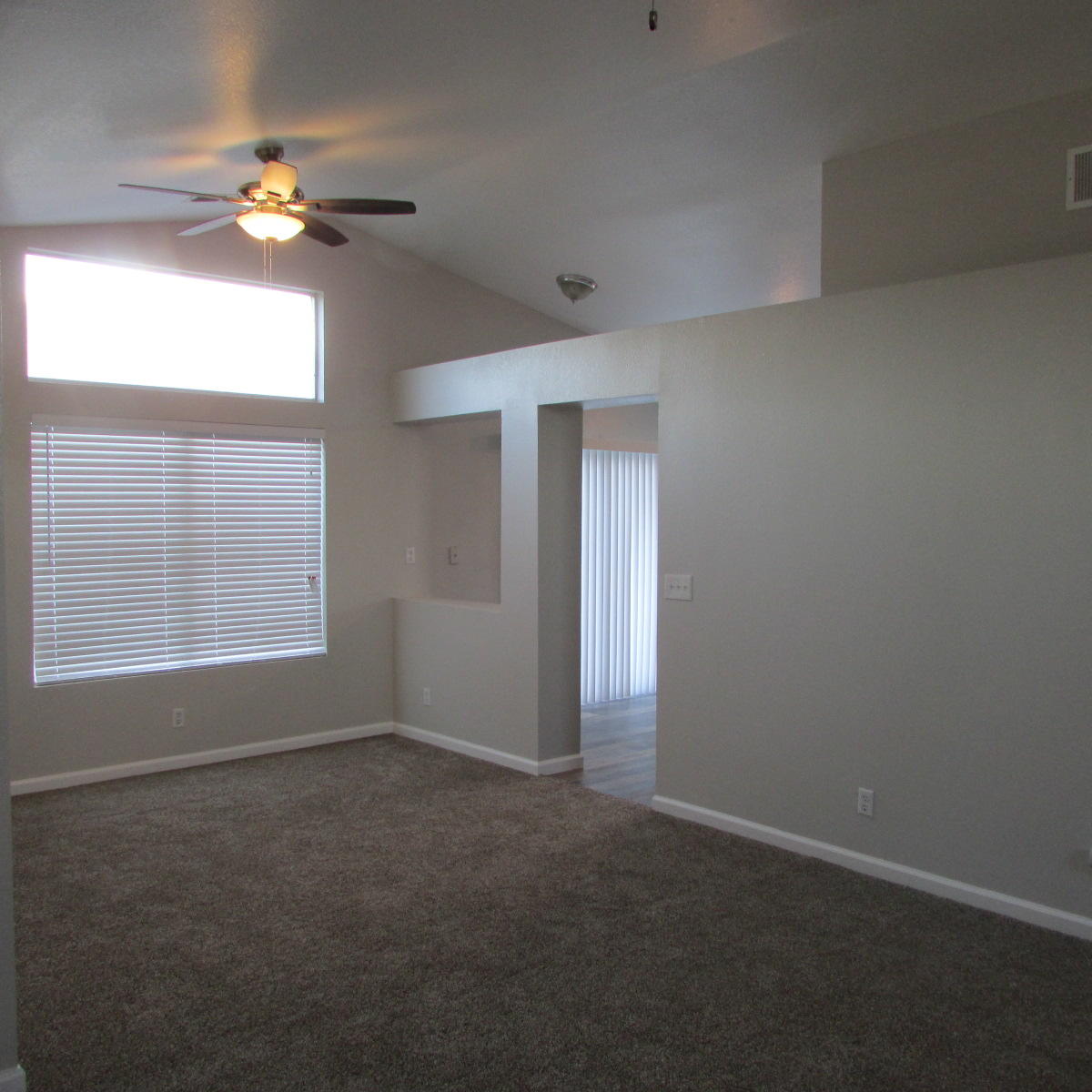 1832 Ivory Avenue Palmdale, CA 93550 - Photo 12 of 52 a view of an empty room with a window