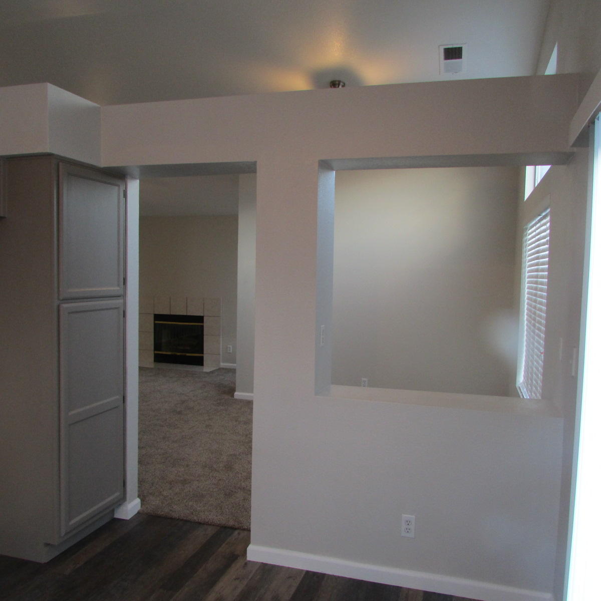 1832 Ivory Avenue Palmdale, CA 93550 - Photo 23 of 52 an empty room with wooden floor