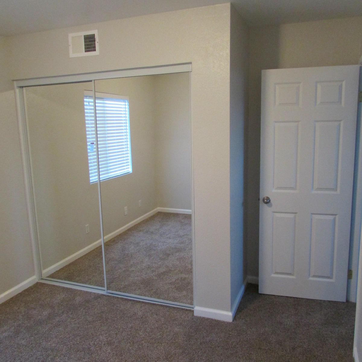 1832 Ivory Avenue Palmdale, CA 93550 - Photo 44 of 52 a view of an empty room with window