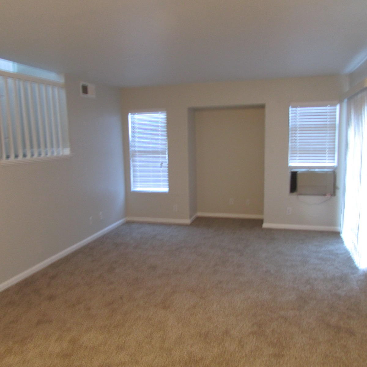 1832 Ivory Avenue Palmdale, CA 93550 - Photo 46 of 52 an empty room with windows