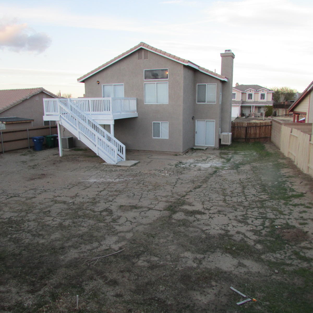1832 Ivory Avenue Palmdale, CA 93550 - Photo 51 of 52 a view of a house with a backyard and stairs